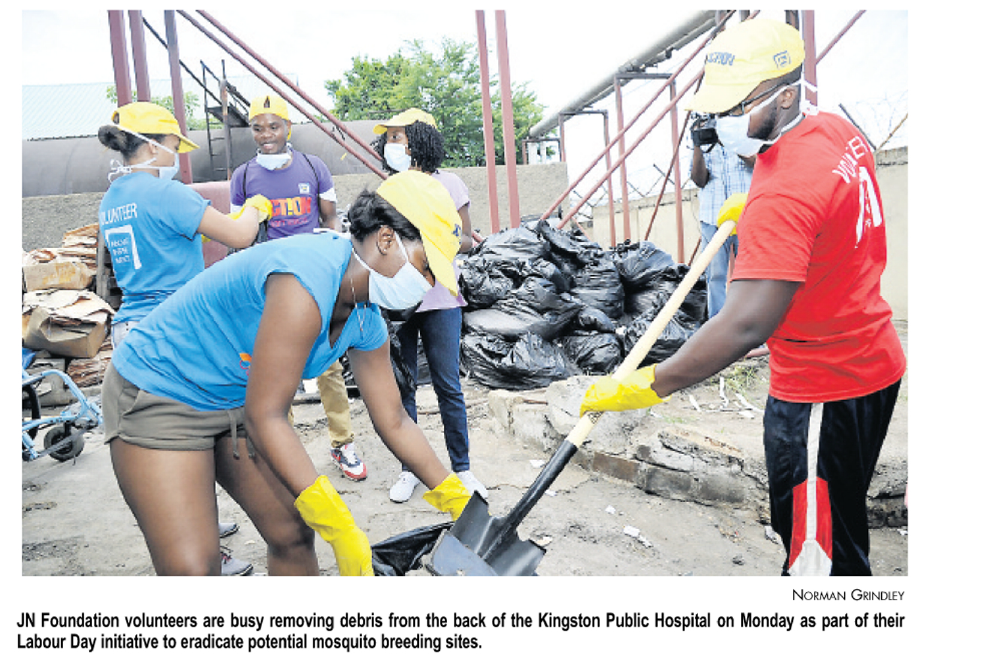JN Foundation volunteers are busy removing debris